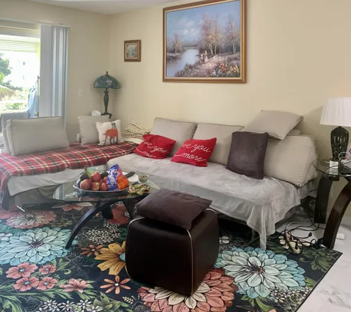 a bedroom with bed and a window