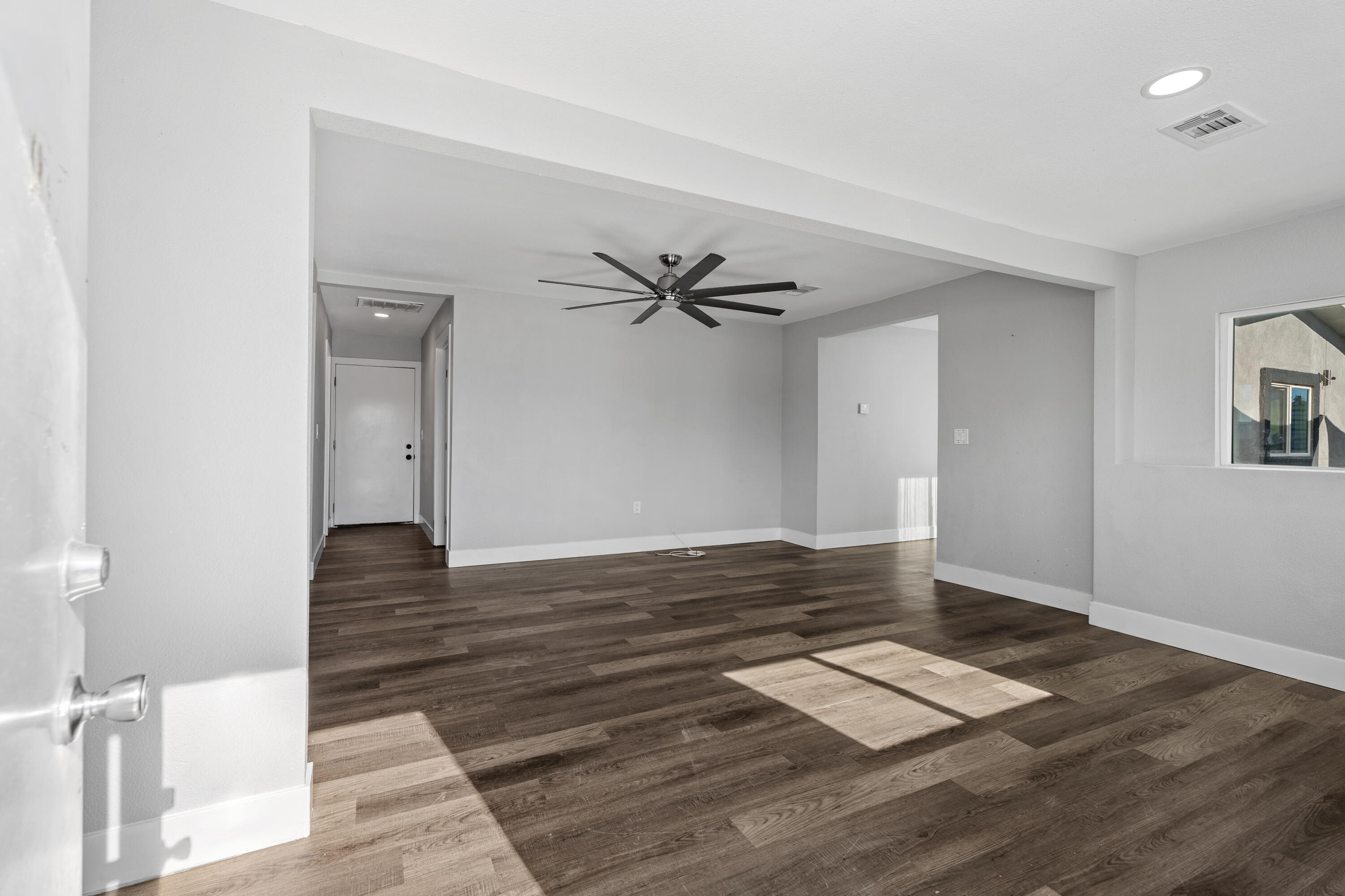 71362 Aurora Road Desert Hot Springs, CA 92241 - Photo 13 of 38 a view of a livingroom with wooden floor