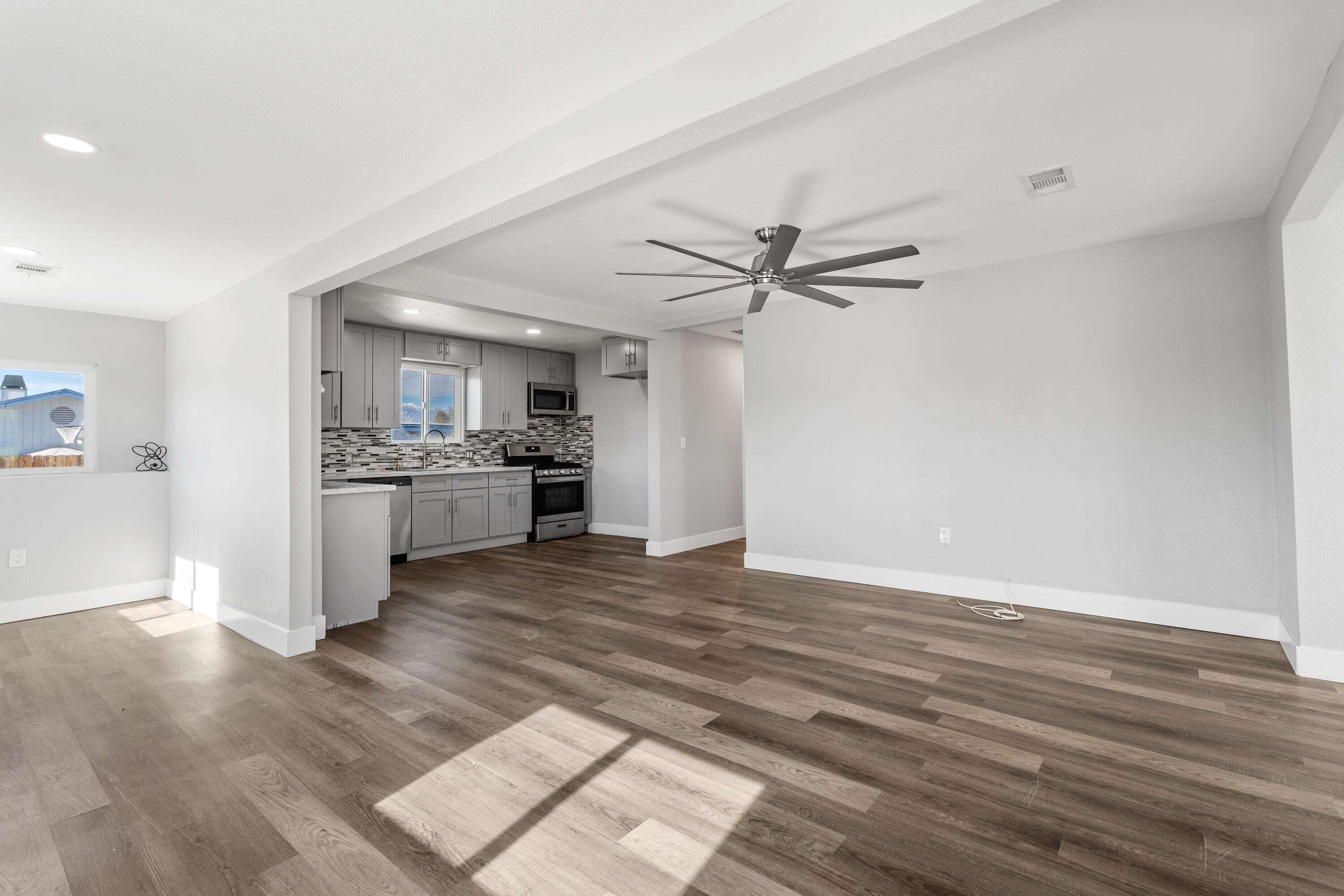 71362 Aurora Road Desert Hot Springs, CA 92241 - Photo 14 of 38 a view of a kitchen with a sink and a stove top oven
