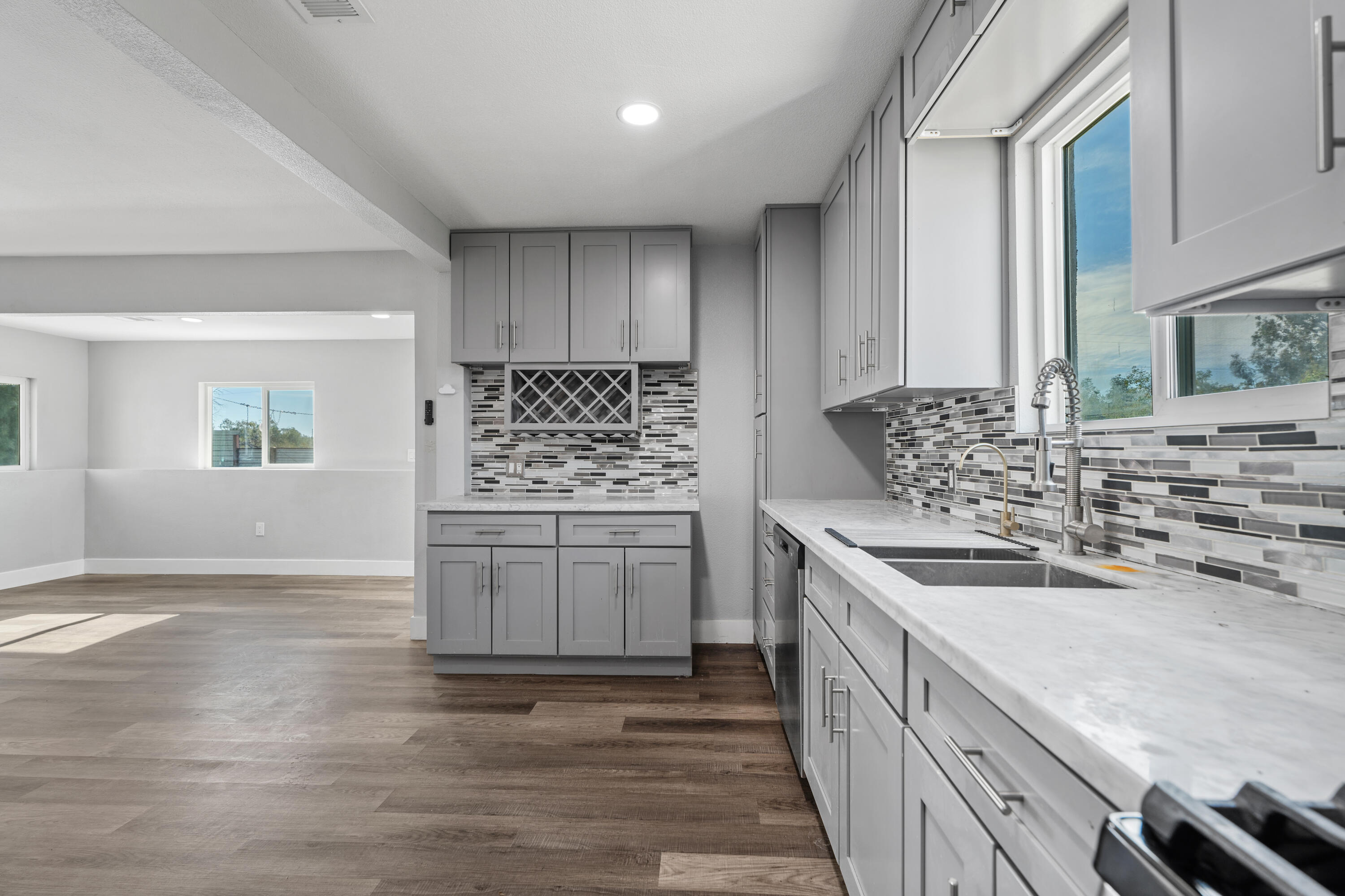 71362 Aurora Road Desert Hot Springs, CA 92241 - Photo 20 of 38 a kitchen with stainless steel appliances granite countertop a sink stove and cabinets