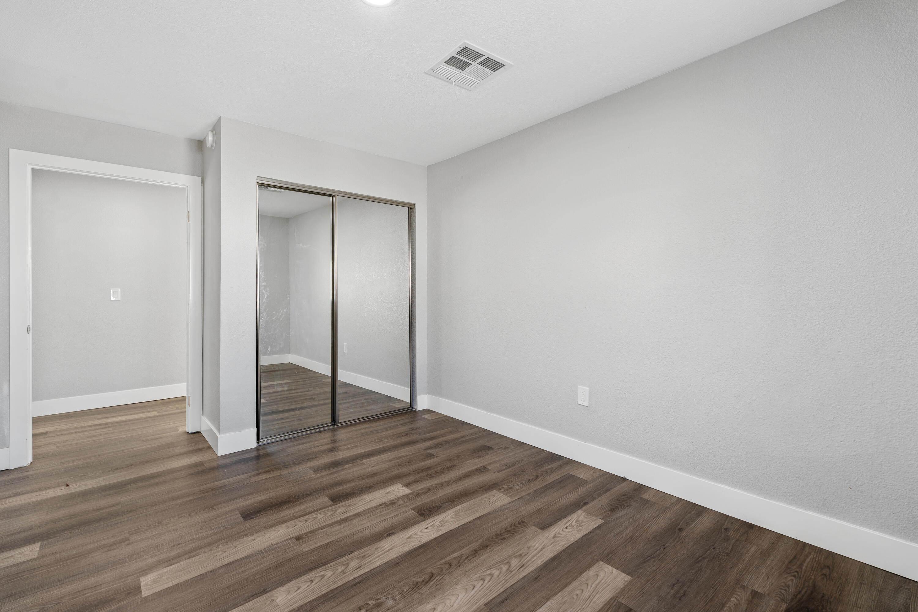 71362 Aurora Road Desert Hot Springs, CA 92241 - Photo 29 of 38 wooden floor in an empty room
