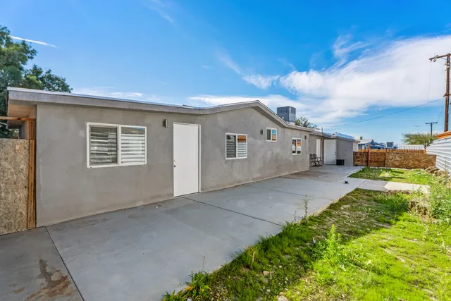 a view of a back yard of the house