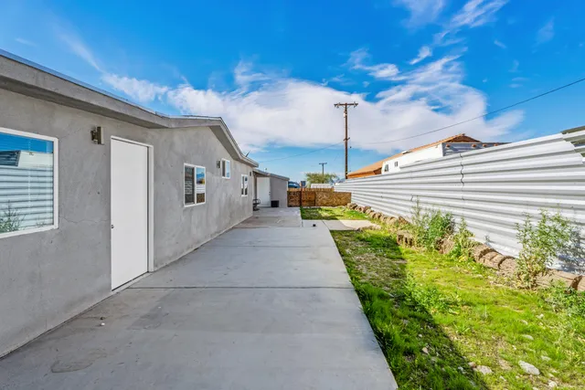 a view of a porch with a yard