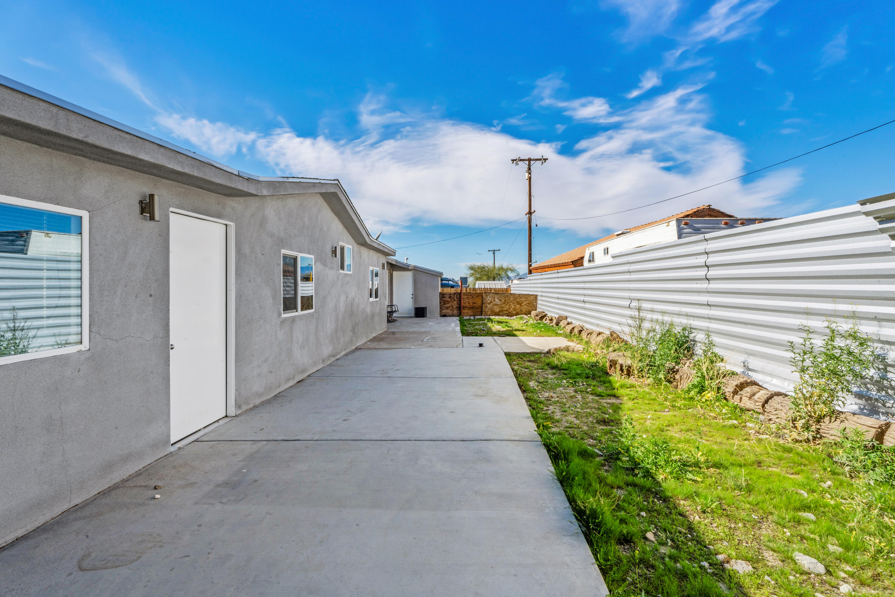 71362 Aurora Road Desert Hot Springs, CA 92241 - Photo 37 of 38 a view of a porch with a yard