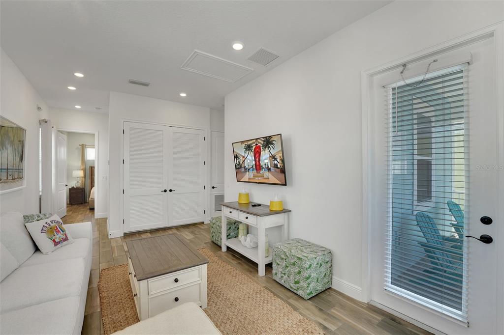 2968 Salted Rim Road Kissimmee, FL 34747 - Photo 19 of 86 a living room with furniture and a baby crib