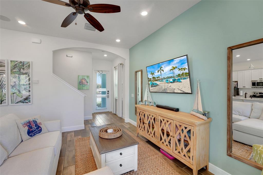 2968 Salted Rim Road Kissimmee, FL 34747 - Photo 3 of 86 a living room with furniture and a flat screen tv