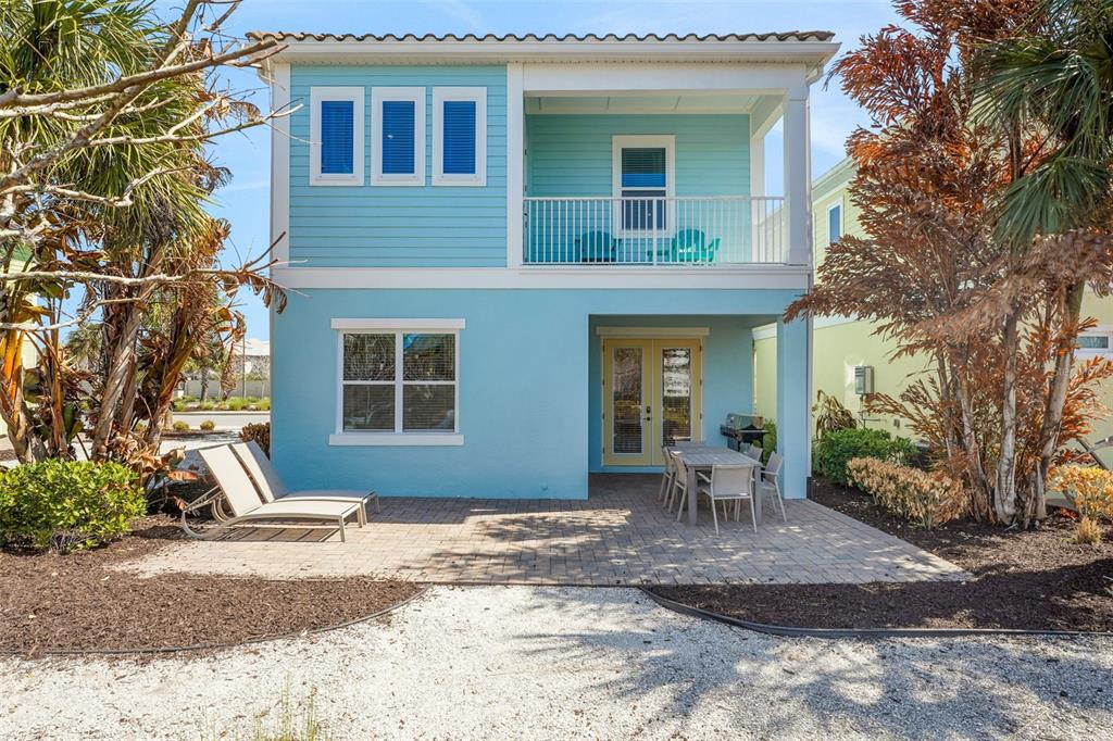 2968 Salted Rim Road Kissimmee, FL 34747 - Photo 33 of 86 a front view of a house with outdoor seating