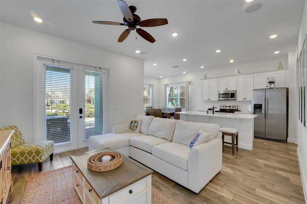 2968 Salted Rim Road Kissimmee, FL 34747 - Photo 4 of 86 a living room with furniture and a wooden floor