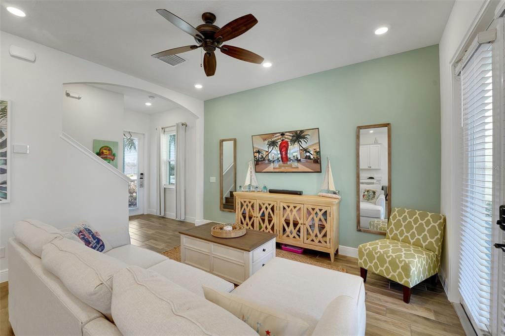 2968 Salted Rim Road Kissimmee, FL 34747 - Photo 5 of 86 a bedroom with furniture and a wooden floor