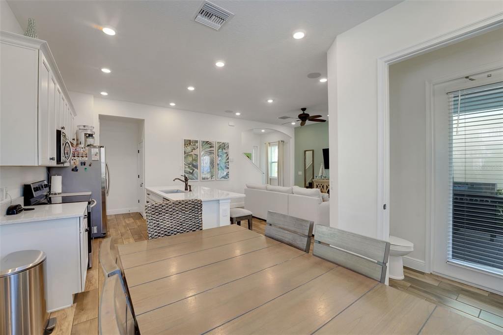 2968 Salted Rim Road Kissimmee, FL 34747 - Photo 10 of 86 a living room with furniture and a table