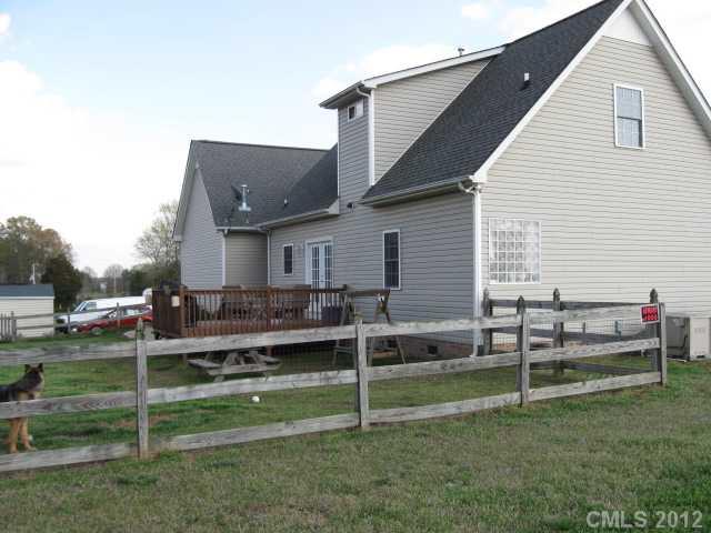 3601 Haigler Road Monroe, NC 28110 - Photo 3 of 14 a view of a house with a backyard