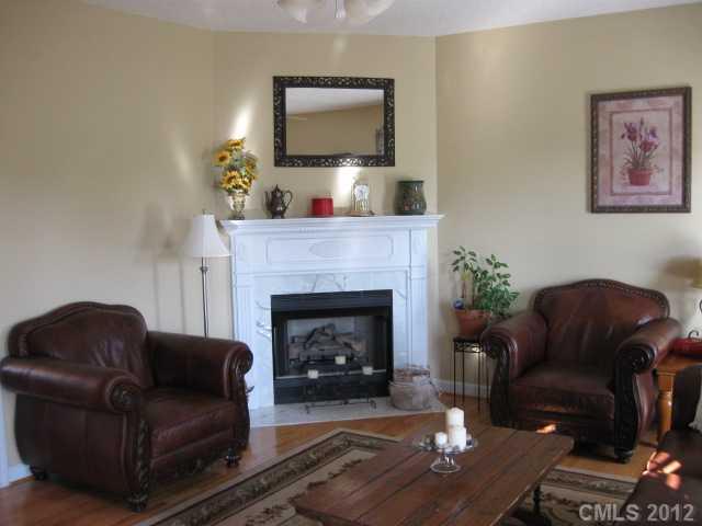 3601 Haigler Road Monroe, NC 28110 - Photo 6 of 14 a living room with furniture and a fireplace