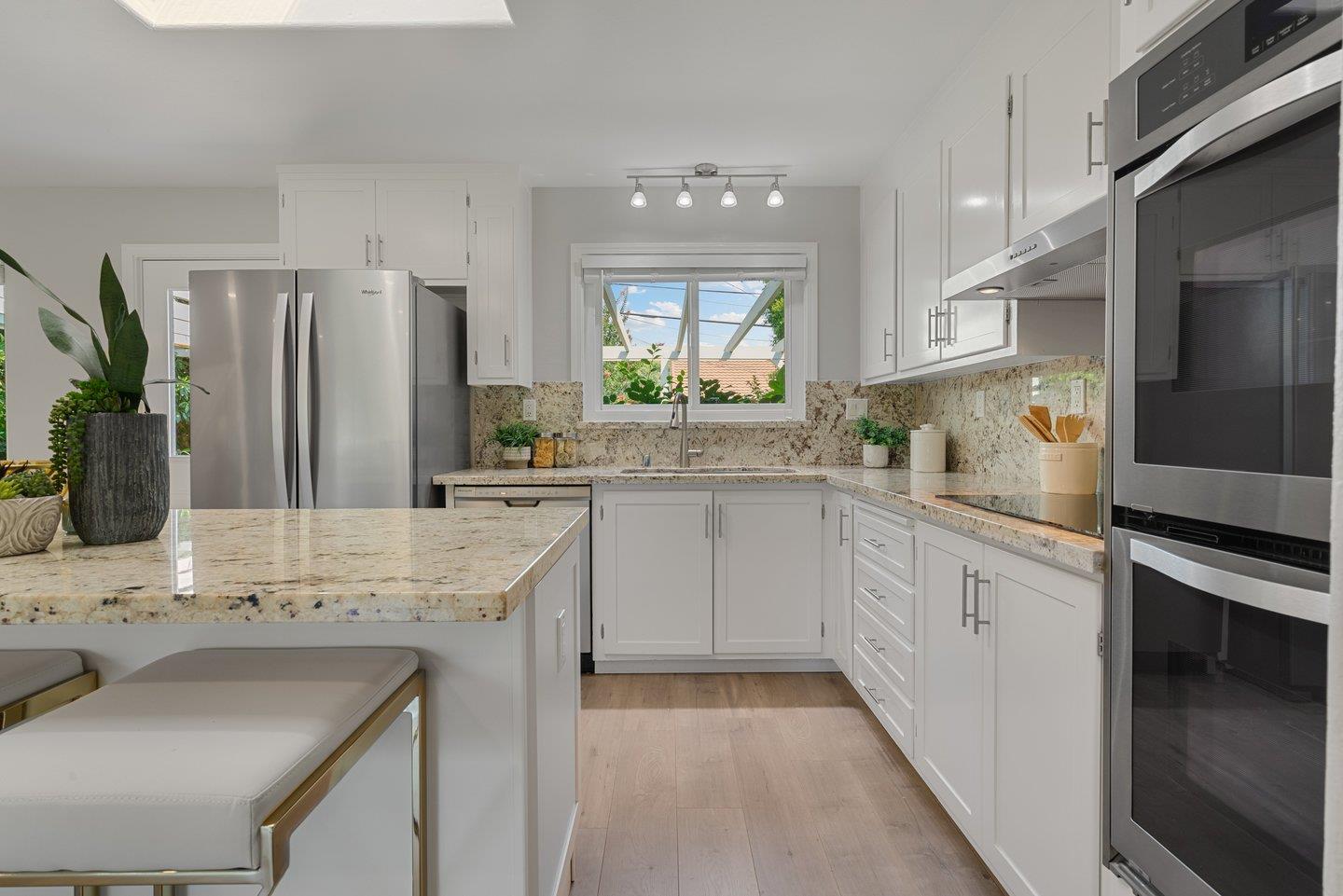 2425 Whitethorne Drive San Jose, CA 95128 - Photo 14 of 48 a kitchen with a sink stove and refrigerator
