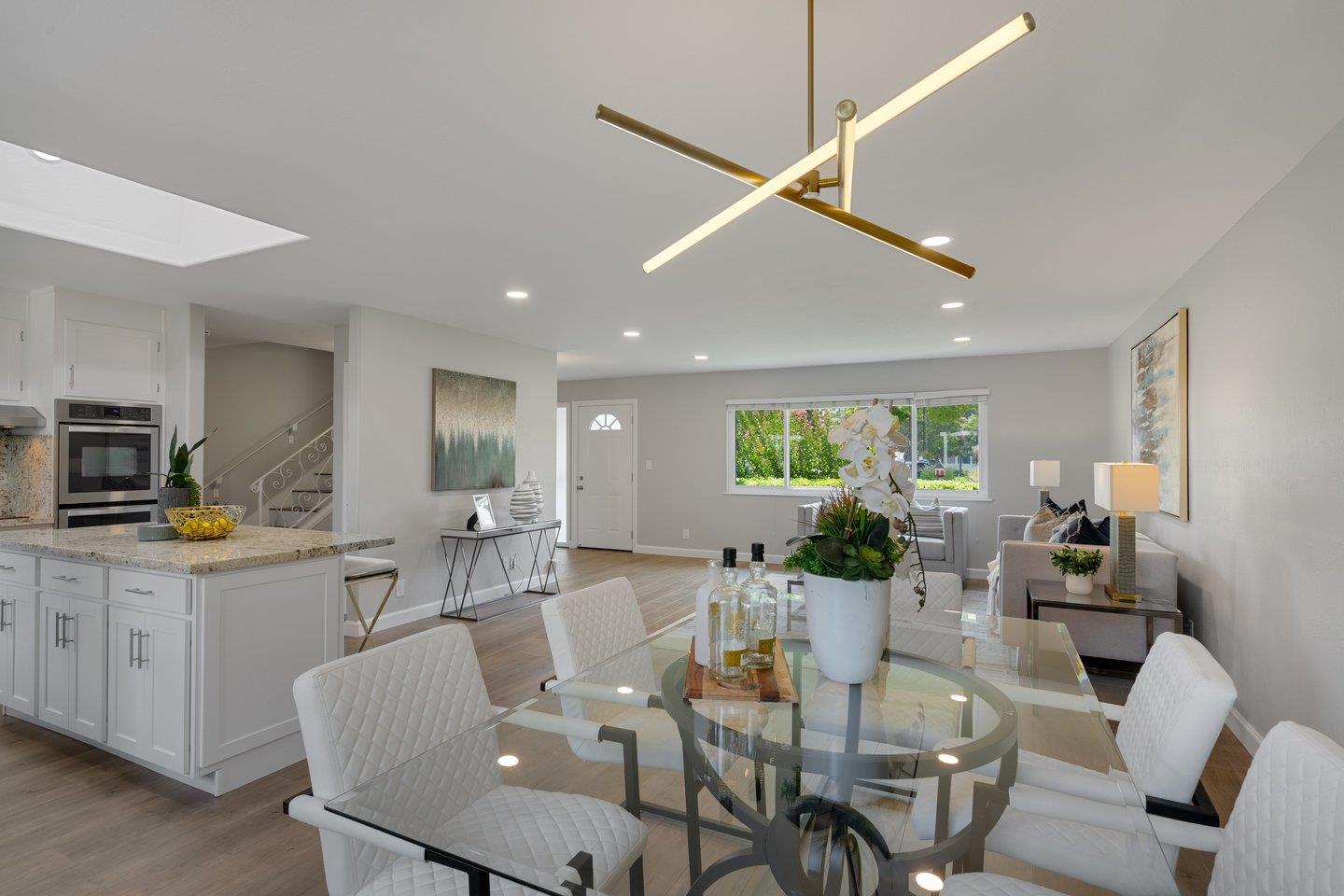 2425 Whitethorne Drive San Jose, CA 95128 - Photo 15 of 48 a view of a dining room with furniture window and wooden floor