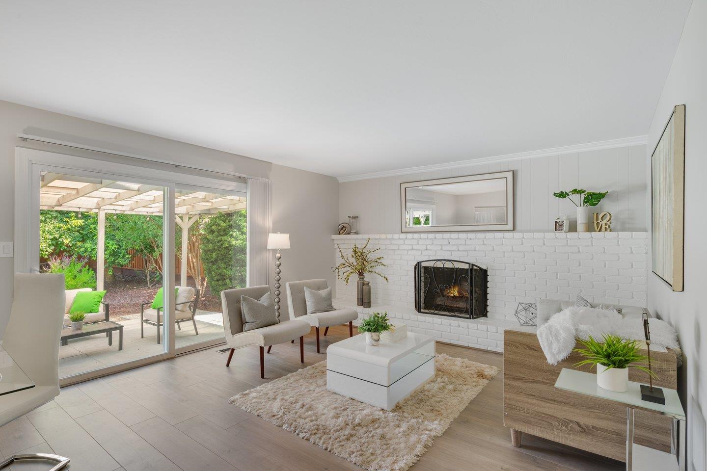 2425 Whitethorne Drive San Jose, CA 95128 - Photo 19 of 48 a living room with furniture and a fireplace