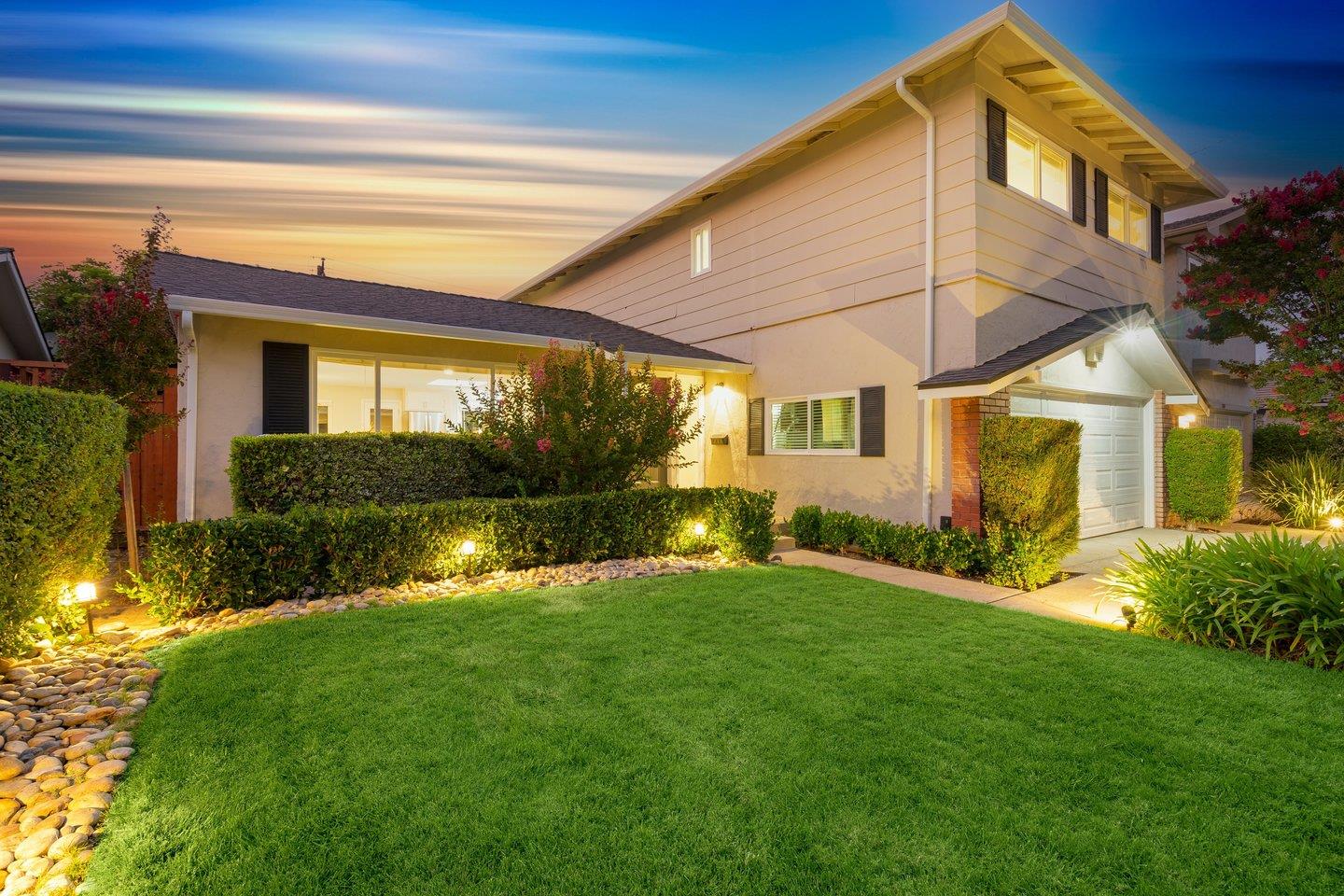 2425 Whitethorne Drive San Jose, CA 95128 - Photo 2 of 48 a view of a house with a yard and plants