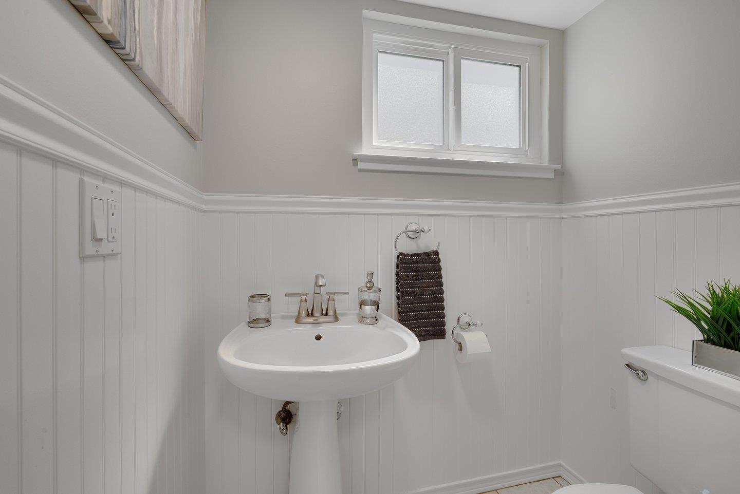 2425 Whitethorne Drive San Jose, CA 95128 - Photo 23 of 48 a bathroom with a sink a mirror and a toilet