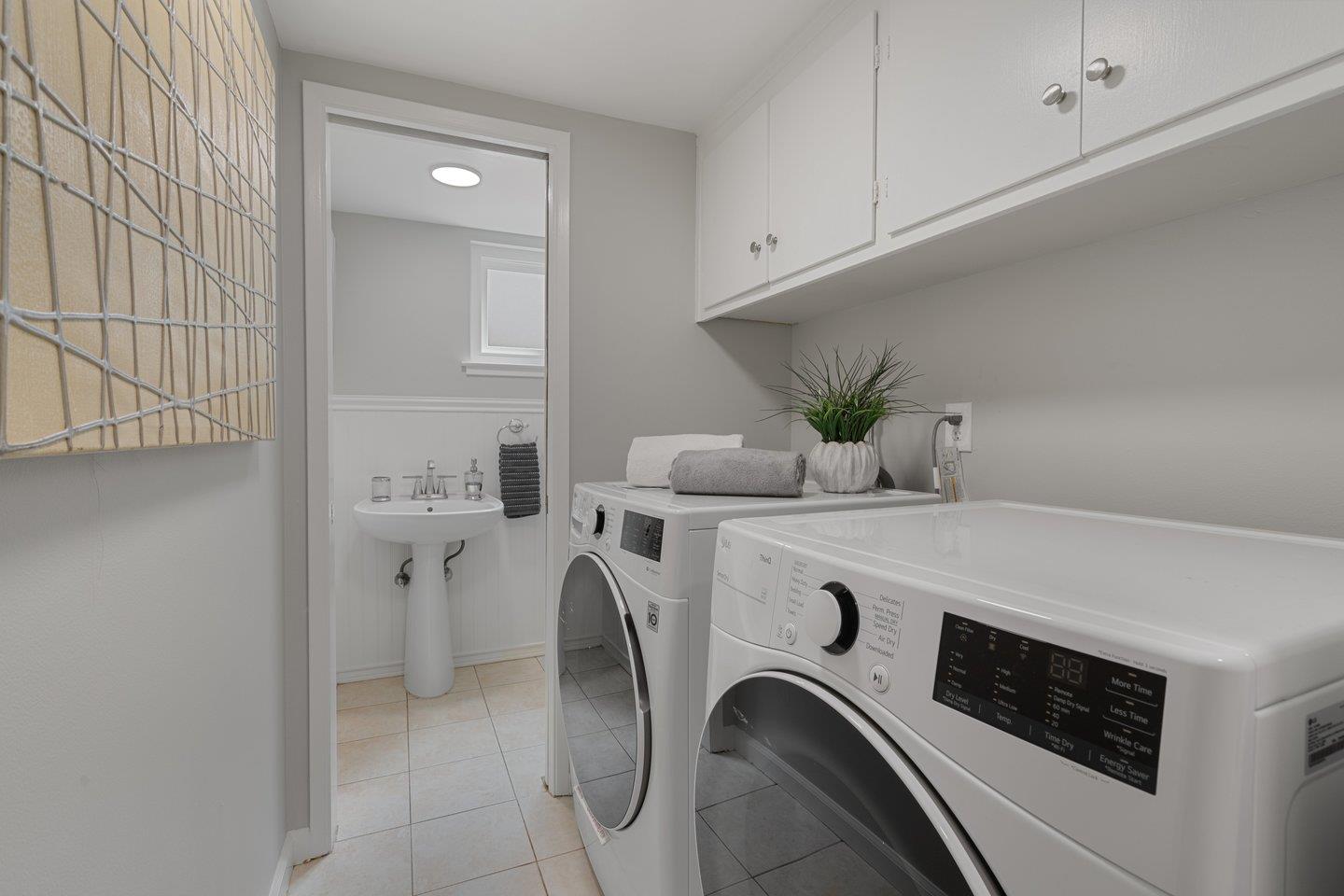 2425 Whitethorne Drive San Jose, CA 95128 - Photo 24 of 48 a utility room with dryer and washer