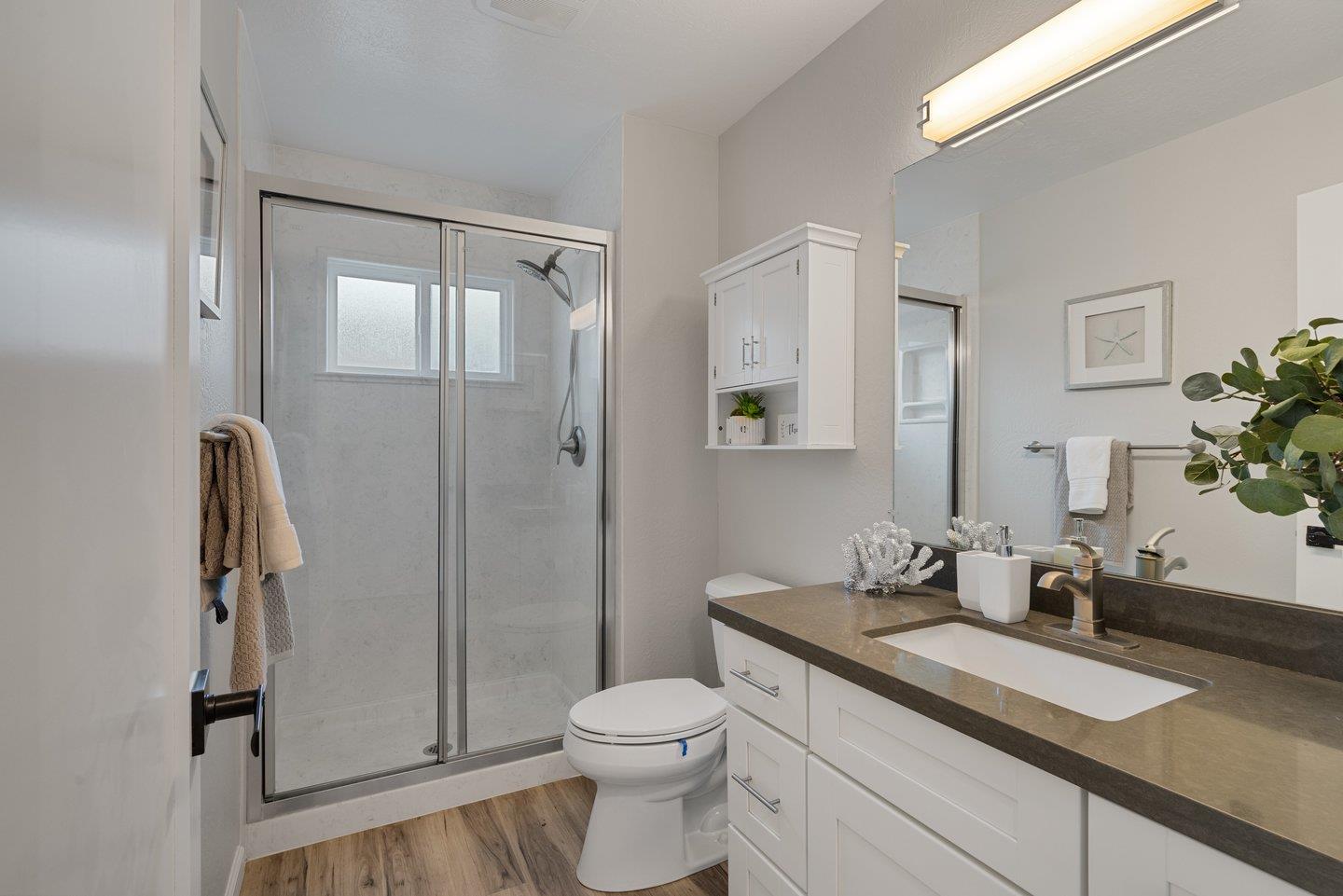 2425 Whitethorne Drive San Jose, CA 95128 - Photo 31 of 48 a bathroom with a granite countertop sink toilet and shower