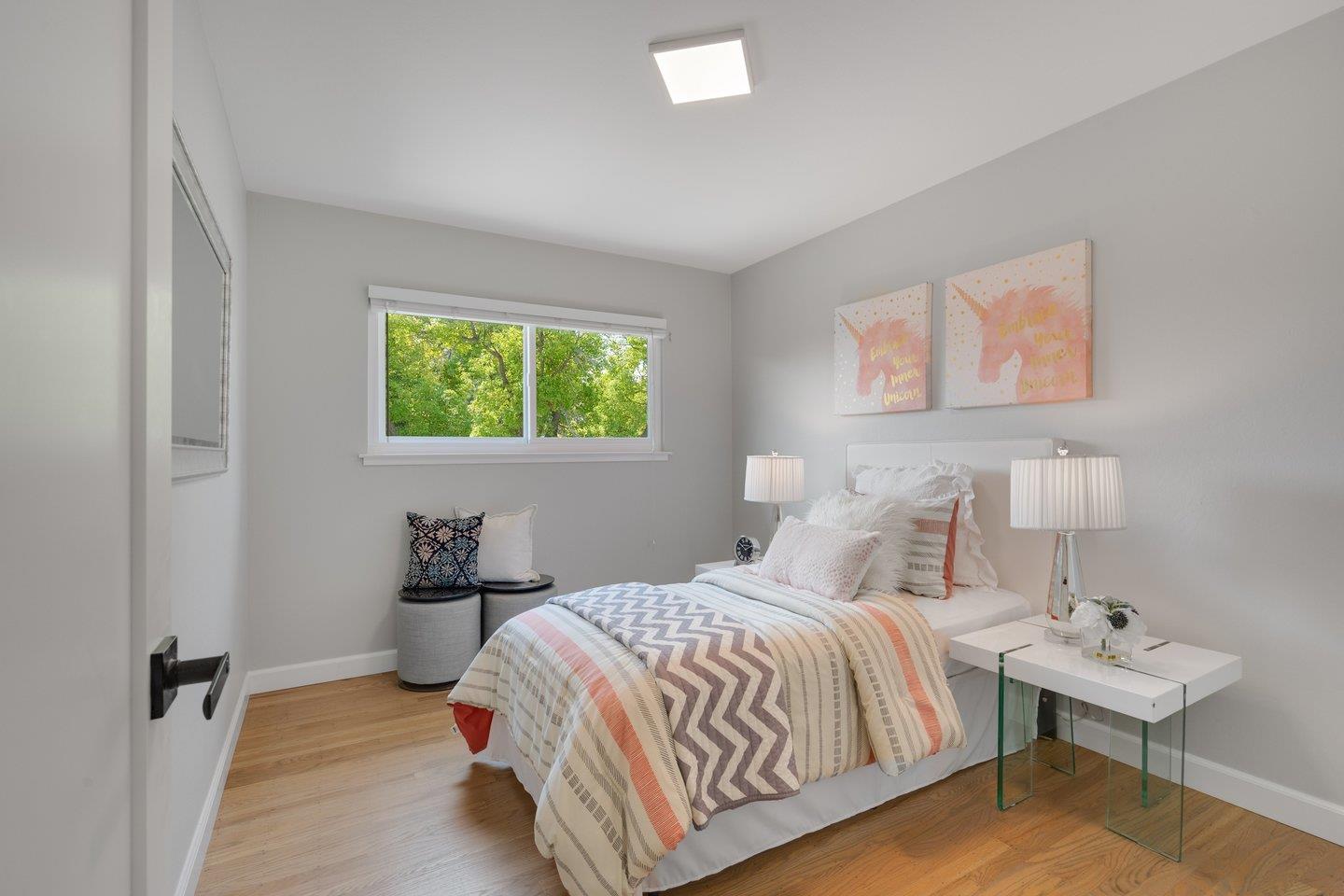 2425 Whitethorne Drive San Jose, CA 95128 - Photo 33 of 48 a bedroom with a bed and a table