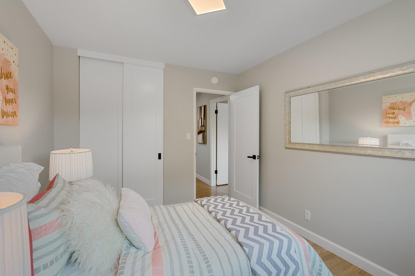 2425 Whitethorne Drive San Jose, CA 95128 - Photo 34 of 48 a bedroom with a bed and a window