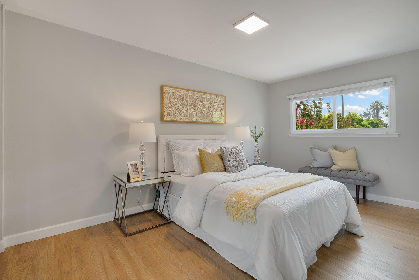 2425 Whitethorne Drive San Jose, CA 95128 - Photo 36 of 48 a bedroom with a bed and a painting on the wall