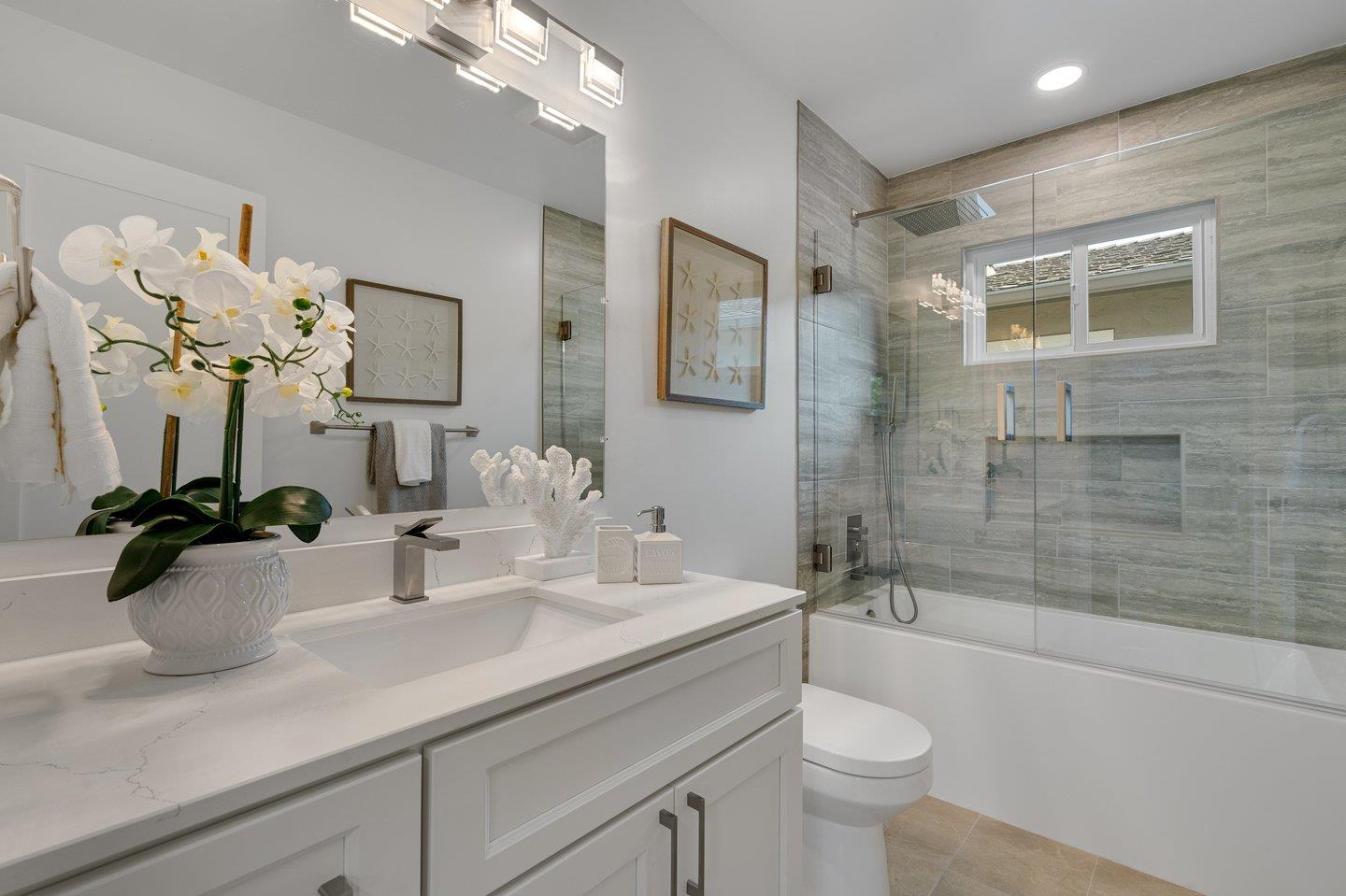 2425 Whitethorne Drive San Jose, CA 95128 - Photo 38 of 48 a bathroom with a sink a toilet and shower