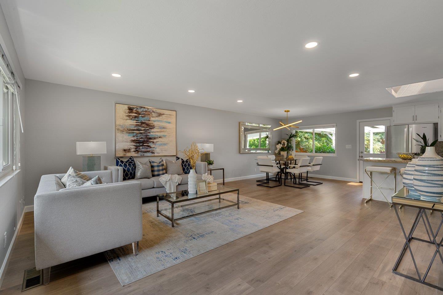 2425 Whitethorne Drive San Jose, CA 95128 - Photo 7 of 48 a living room with furniture and a wooden floor