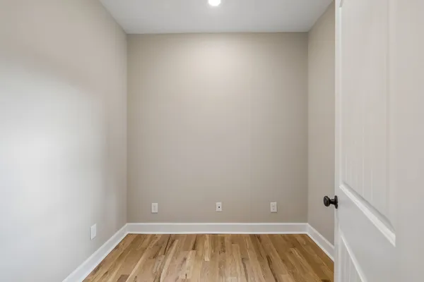 a view of room with racks on the wall