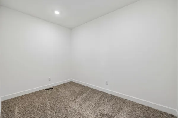 a view of a livingroom with storage & utility room