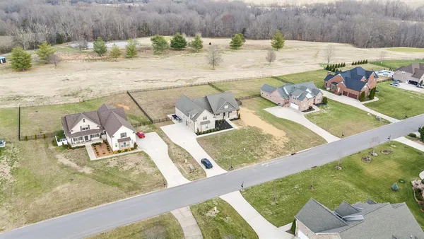 an aerial view of a house with garden
