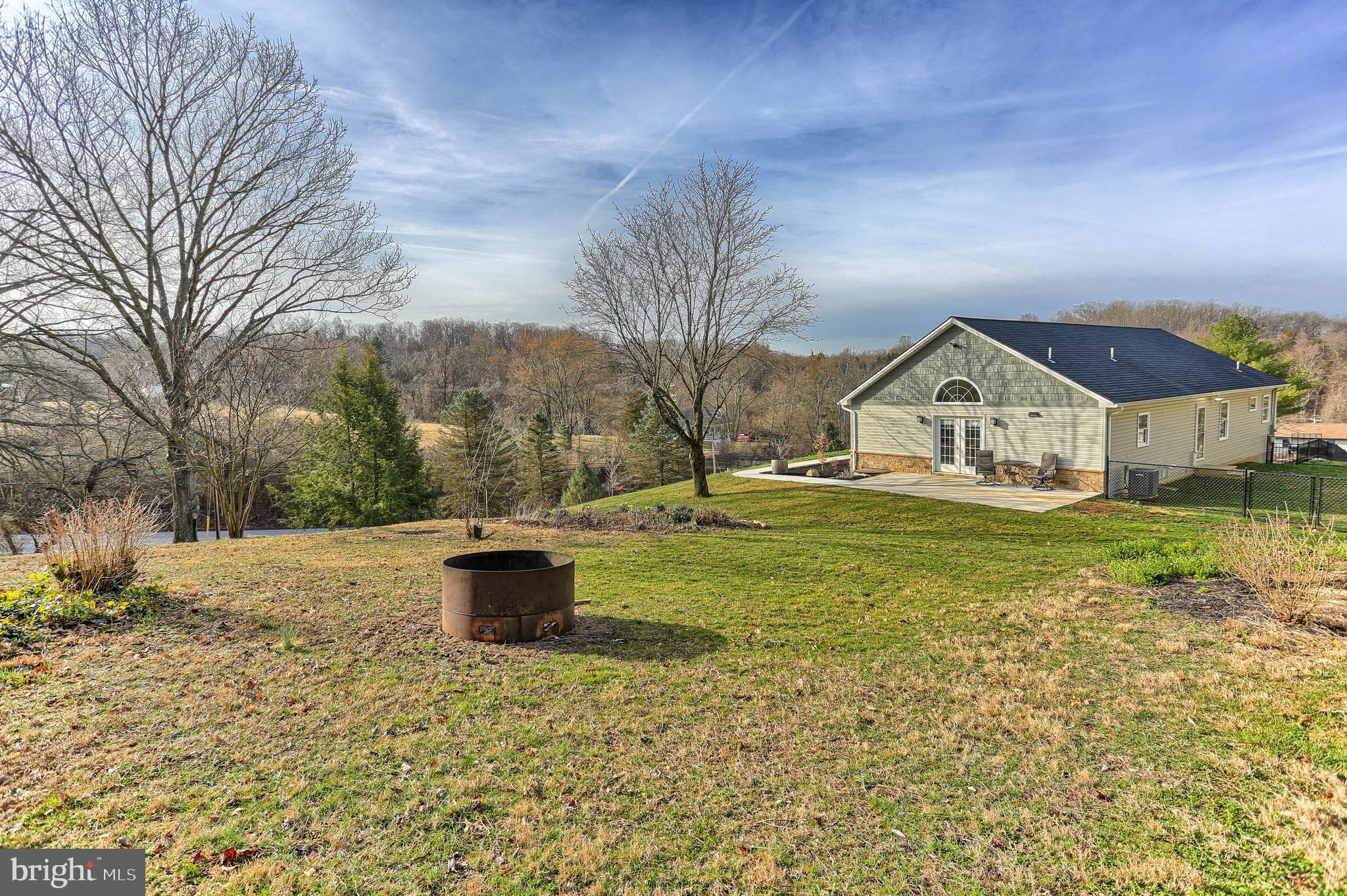 720 Valley Road York, PA 17403 - Photo 40 of 55 Side patio and fire pit area