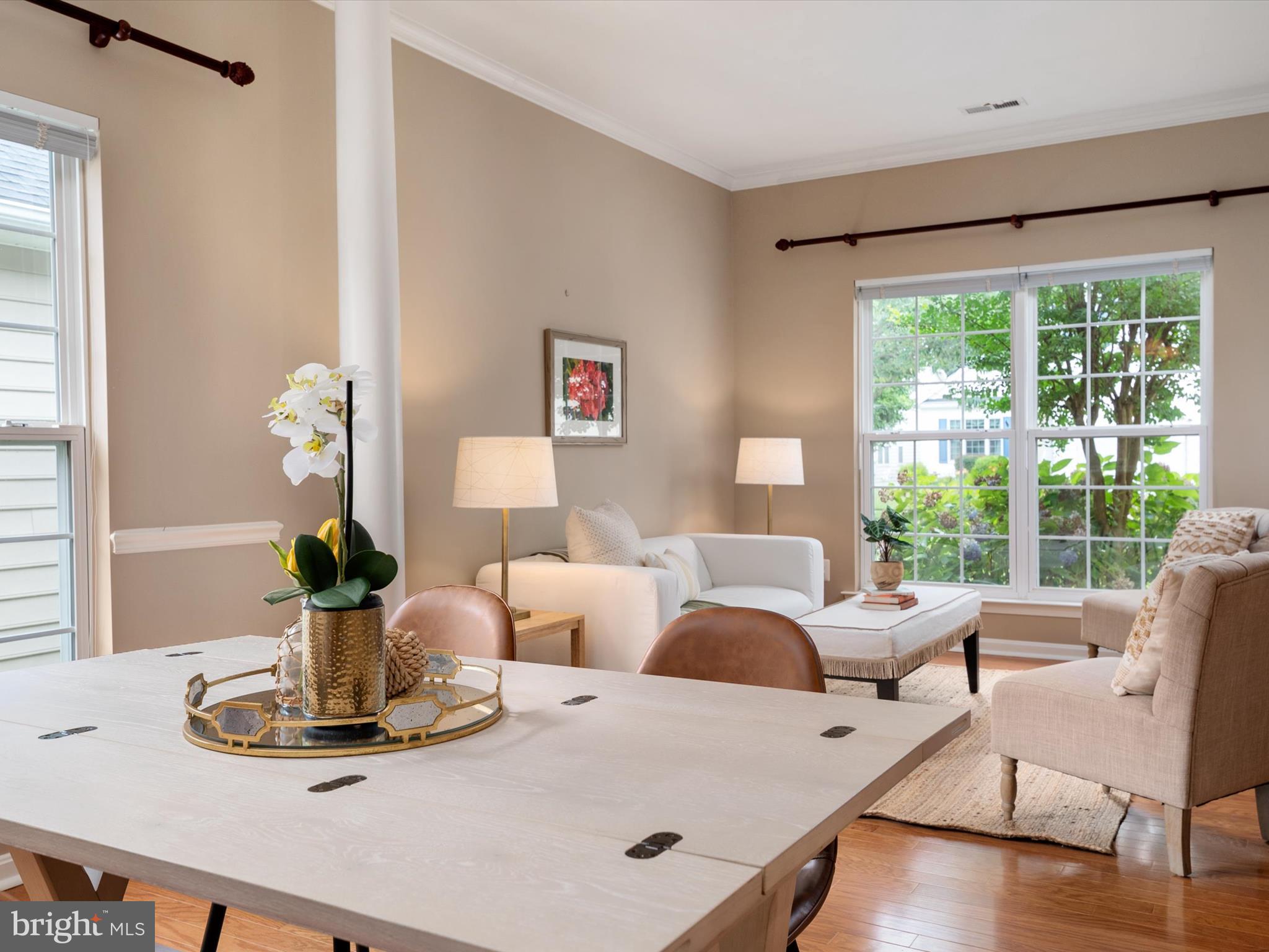 364 Overture Way Centreville, MD 21617 - Photo 13 of 62 a living room with furniture large window and wooden floor