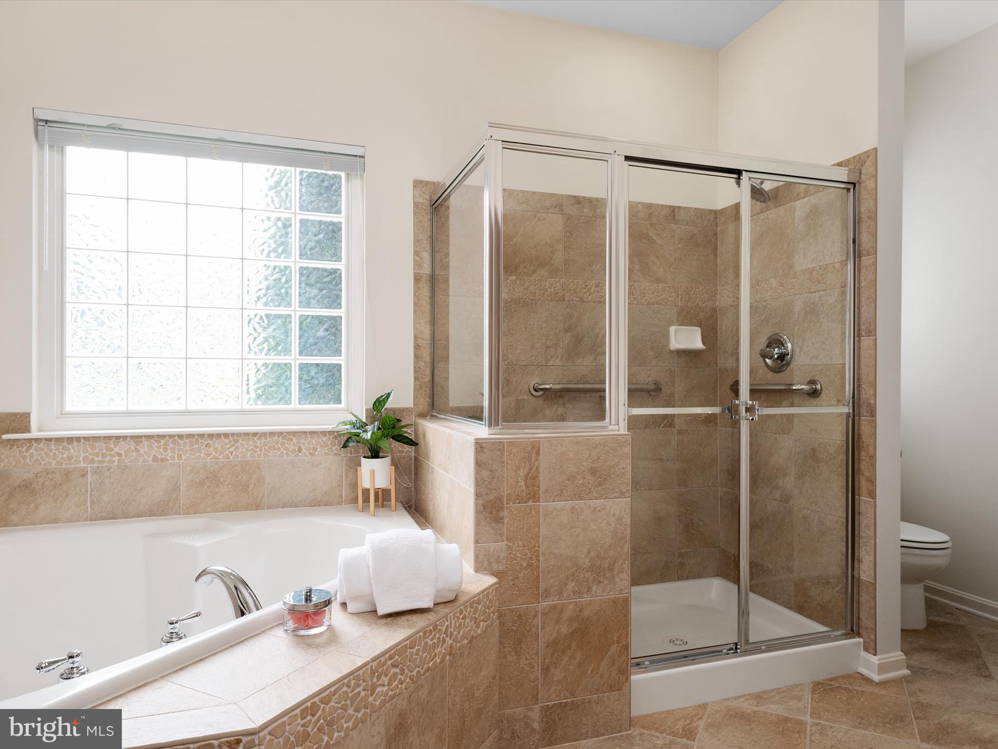 364 Overture Way Centreville, MD 21617 - Photo 26 of 62 a bathroom with a bathtub and a shower