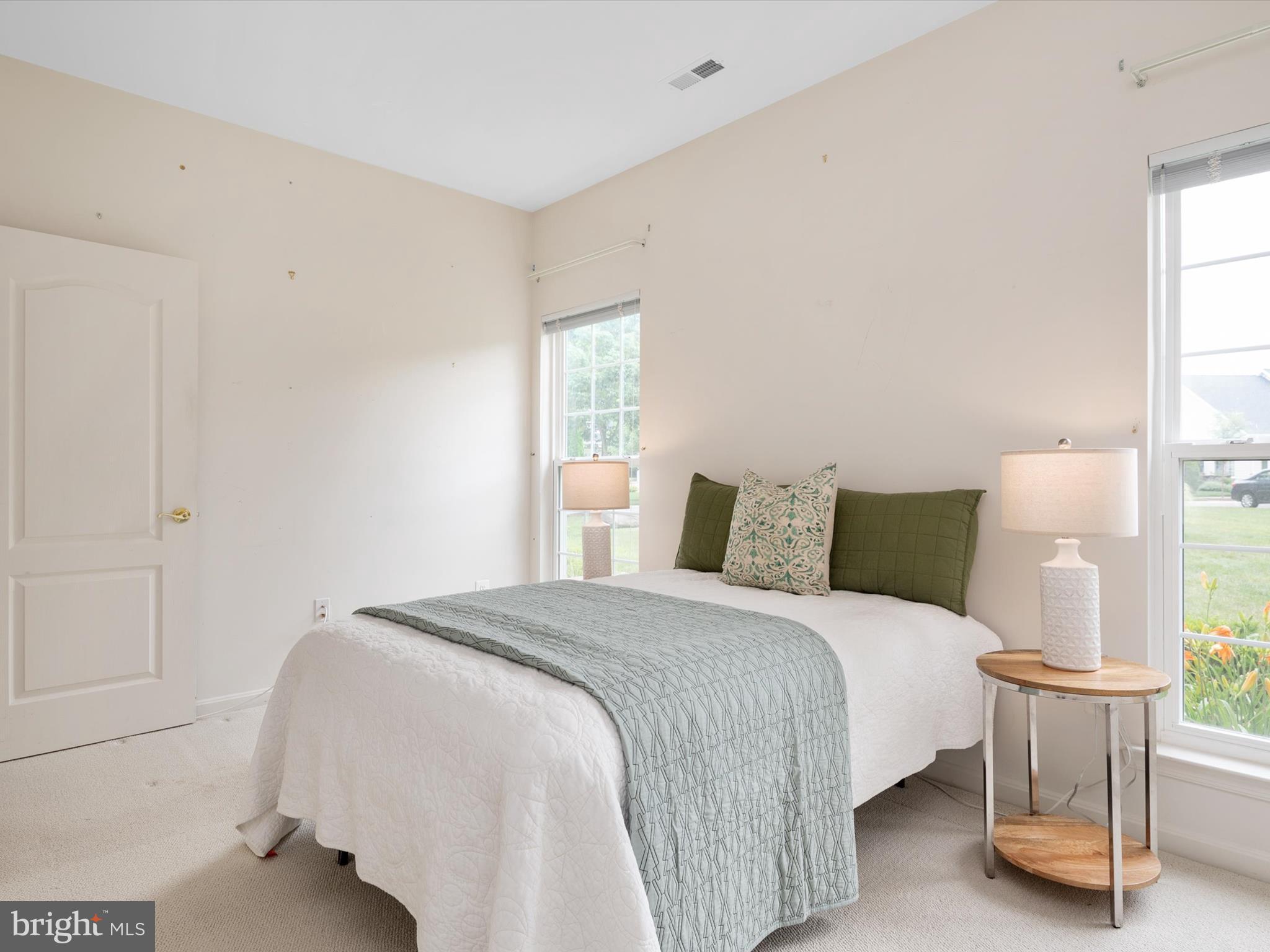 364 Overture Way Centreville, MD 21617 - Photo 28 of 62 a bedroom with a bed and chair