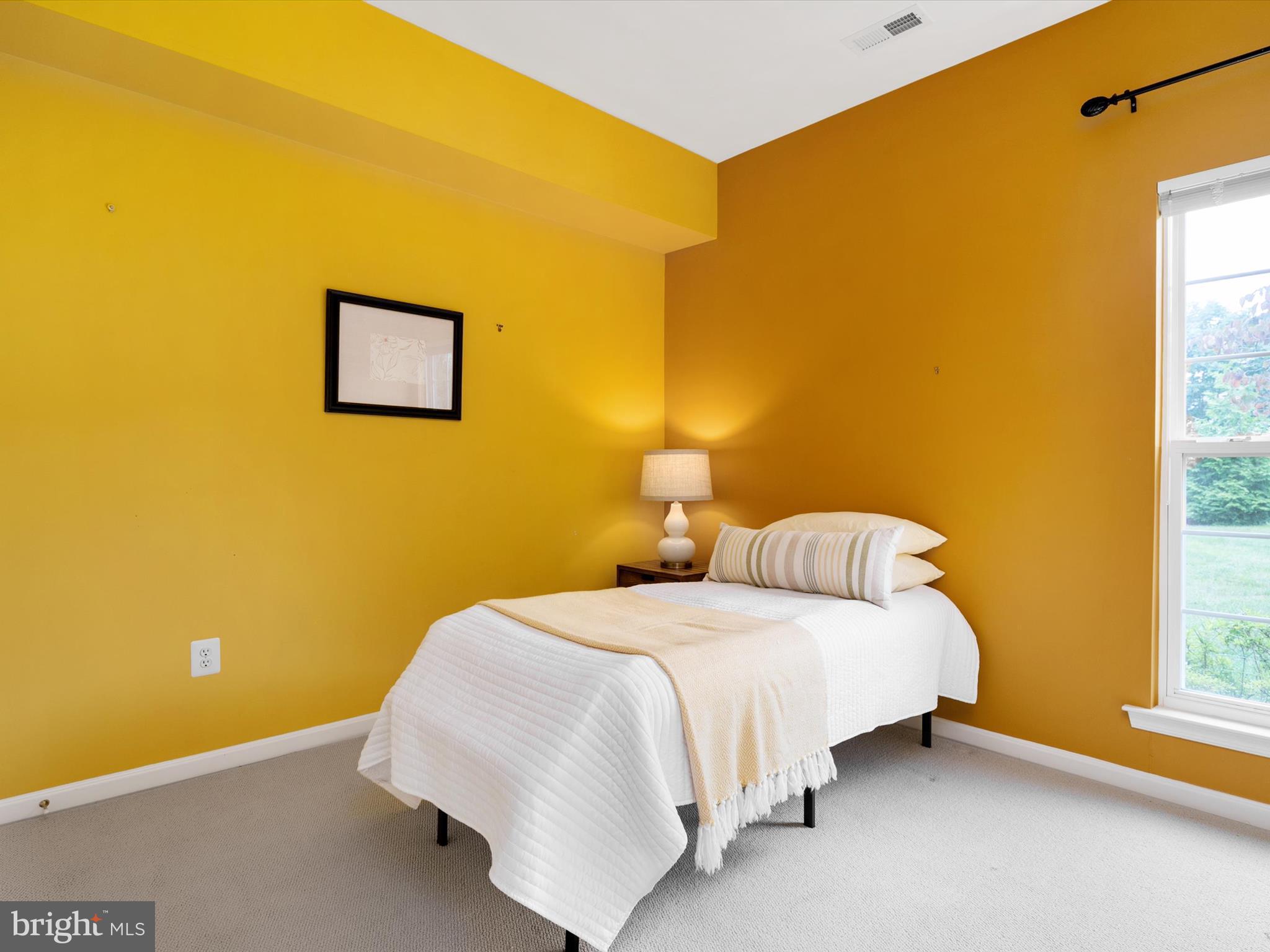 364 Overture Way Centreville, MD 21617 - Photo 29 of 62 a bedroom with a bed and a window