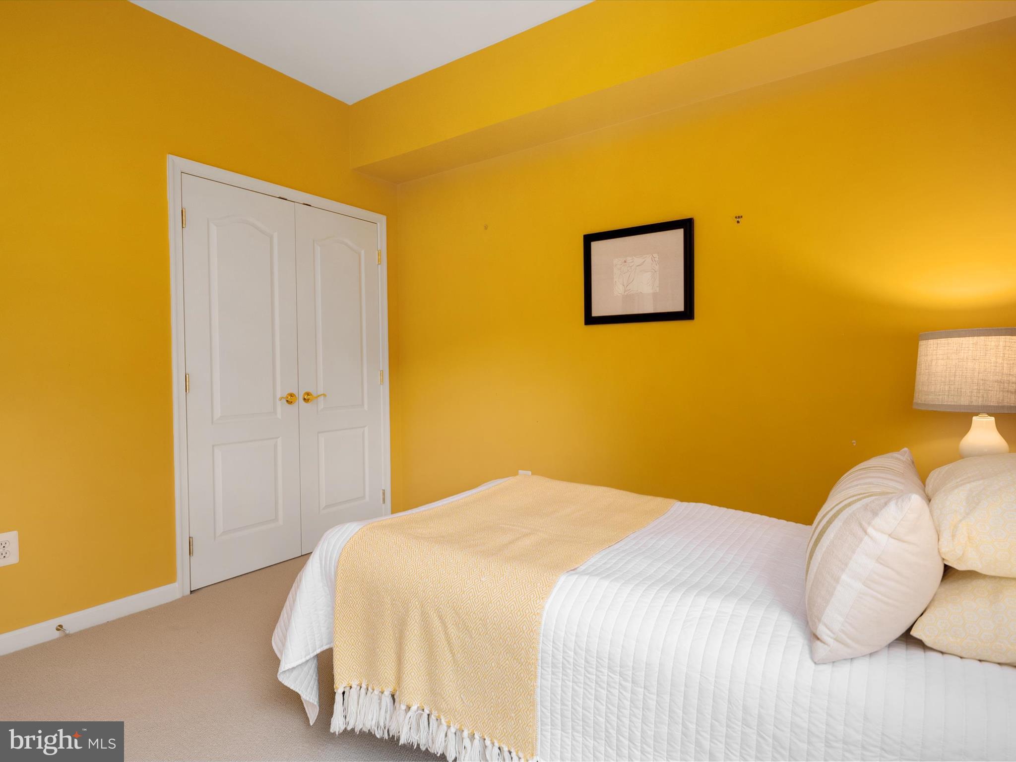 364 Overture Way Centreville, MD 21617 - Photo 30 of 62 a bedroom with a bed and a painting on the wall