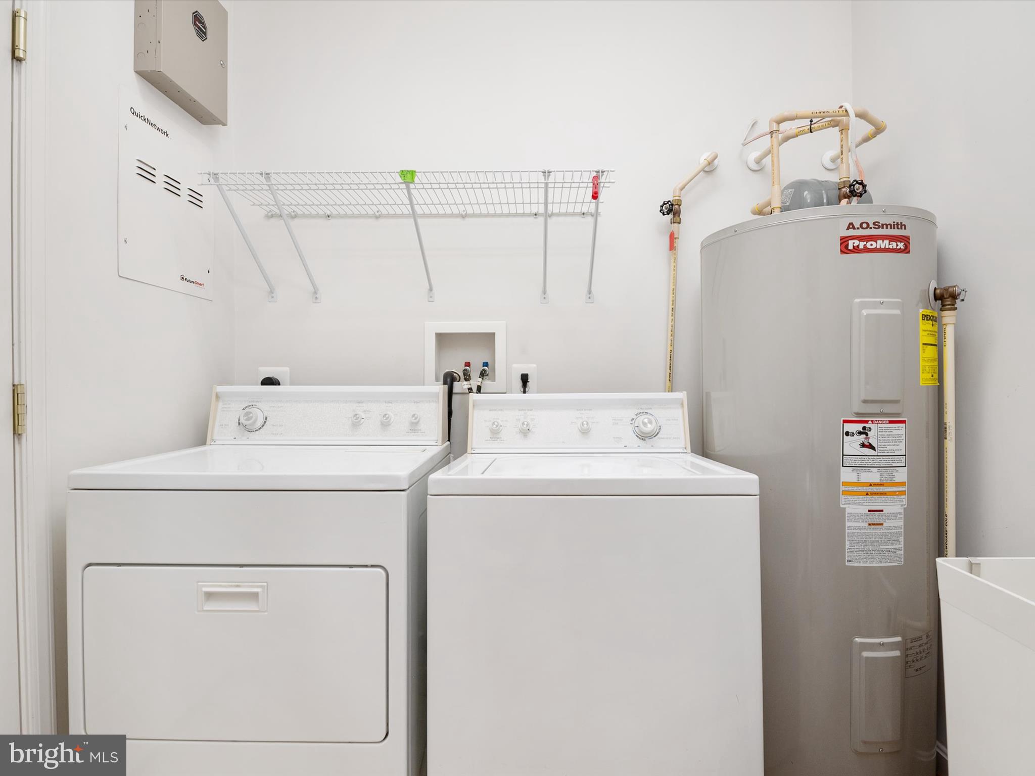 364 Overture Way Centreville, MD 21617 - Photo 32 of 62 a utility room with dryer and washer