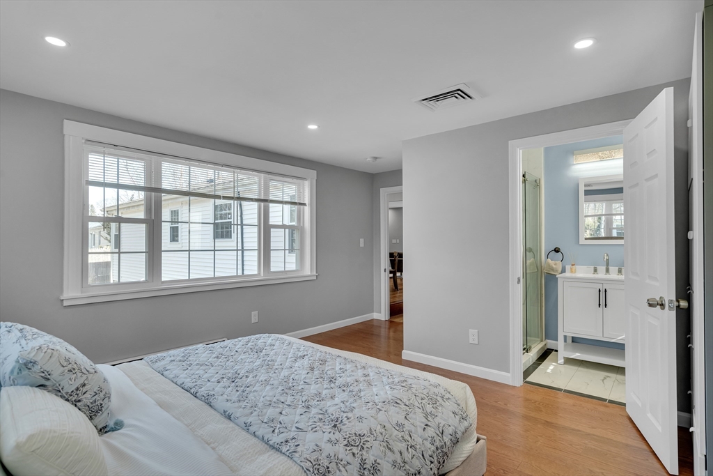 99 Truman Road Newton, MA 02459 - Photo 13 of 26 a bedroom with a bed and a window