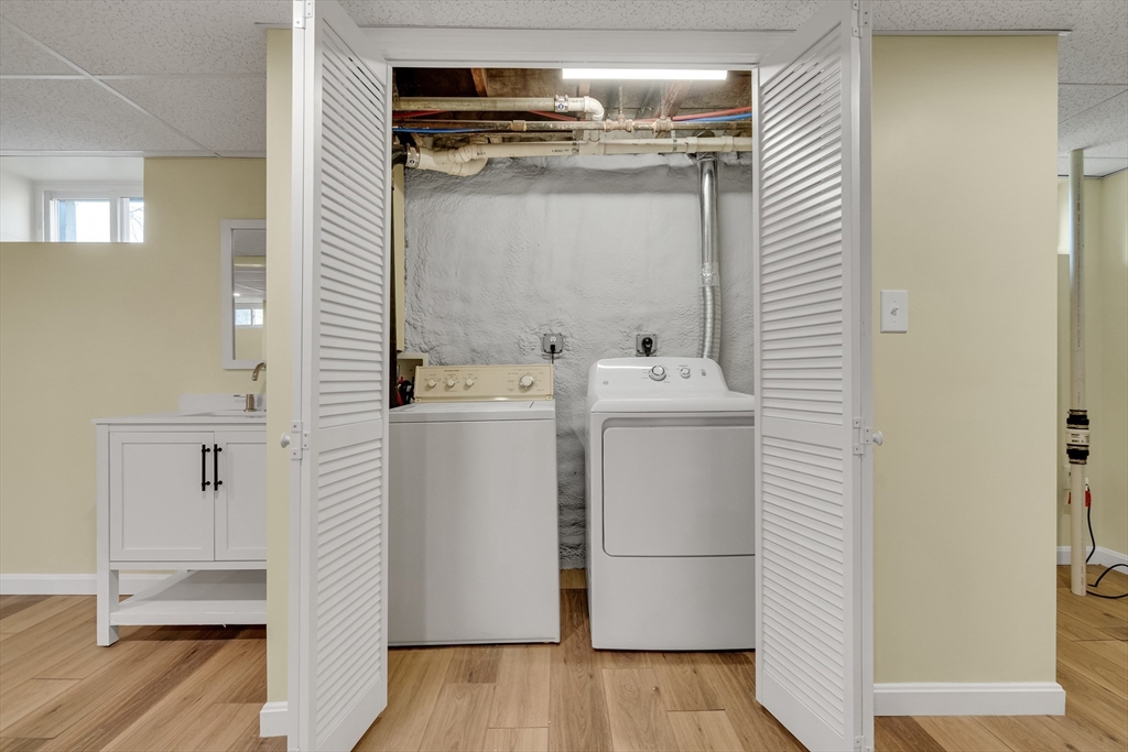 99 Truman Road Newton, MA 02459 - Photo 18 of 26 a utility room with dryer and washer