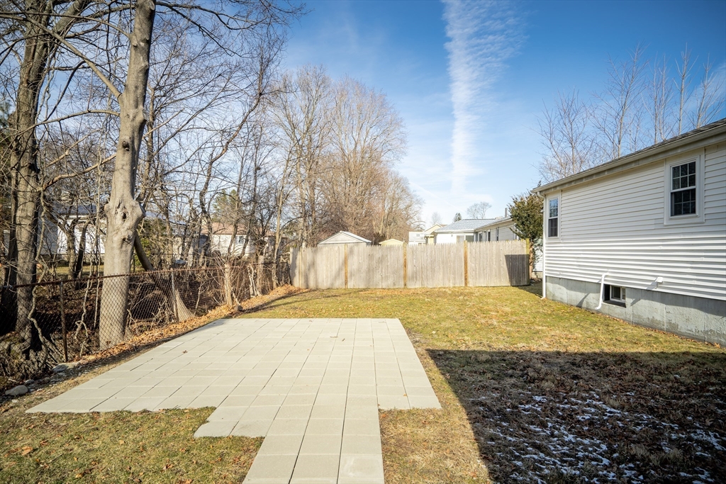 99 Truman Road Newton, MA 02459 - Photo 21 of 26 a view of backyard of the house