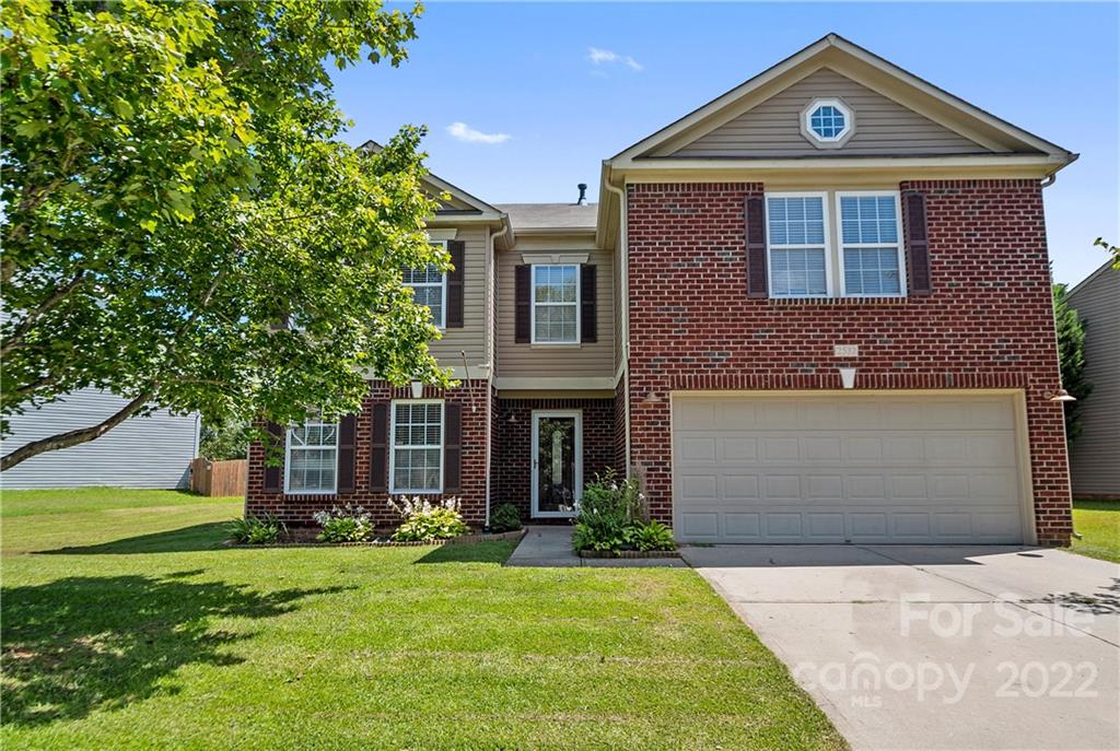 2532 Spring Breeze Way Monroe, NC 28110 - Photo 1 of 21 a front view of a house with a yard