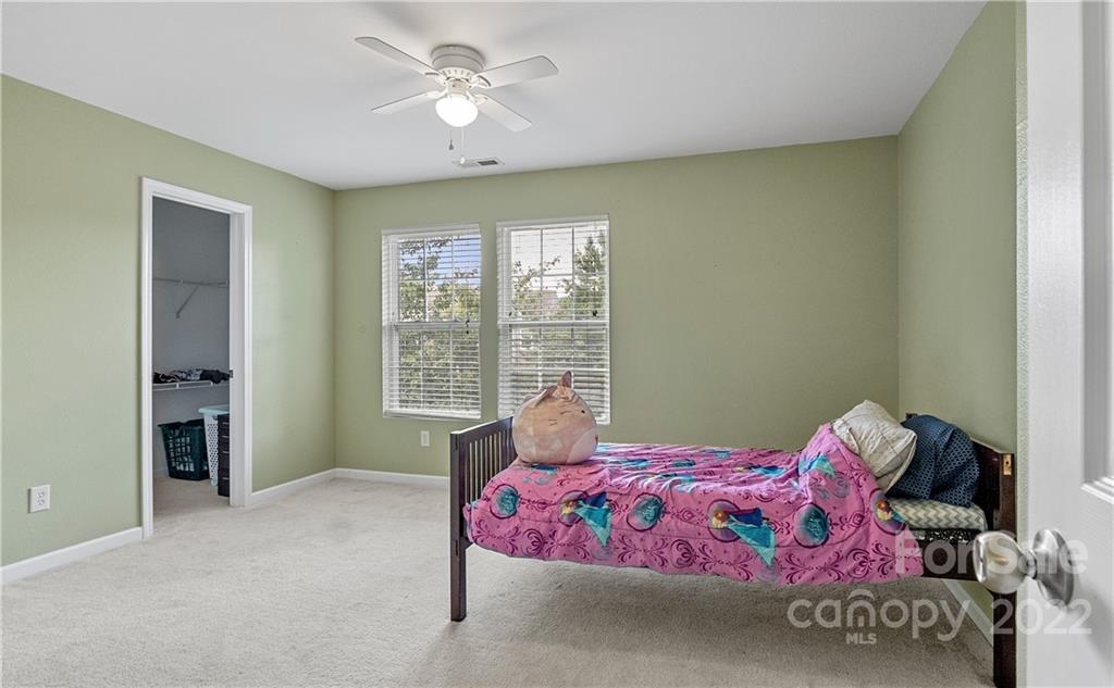 2532 Spring Breeze Way Monroe, NC 28110 - Photo 15 of 21 a bedroom with a bed and window