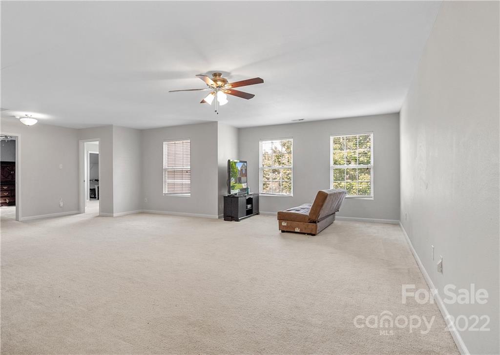 2532 Spring Breeze Way Monroe, NC 28110 - Photo 17 of 21 a living room with furniture and windows