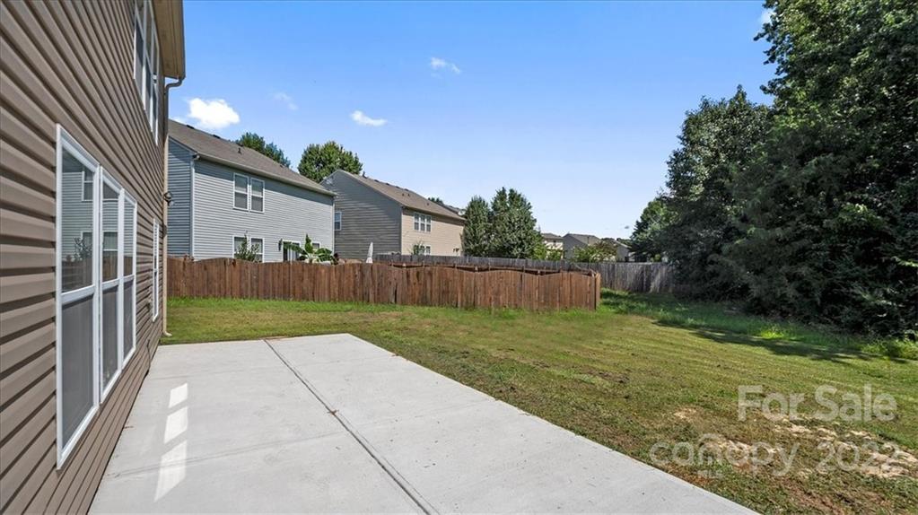 2532 Spring Breeze Way Monroe, NC 28110 - Photo 20 of 21 a view of backyard with green space