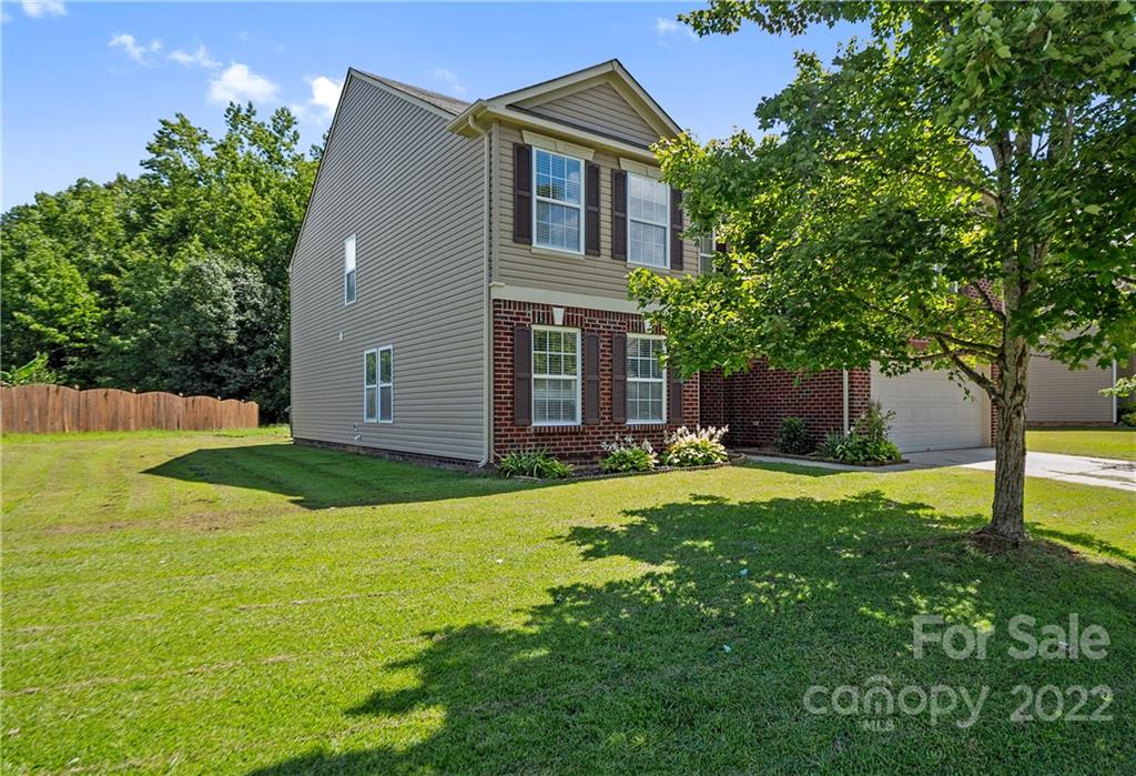2532 Spring Breeze Way Monroe, NC 28110 - Photo 3 of 21 front view of a house with a yard