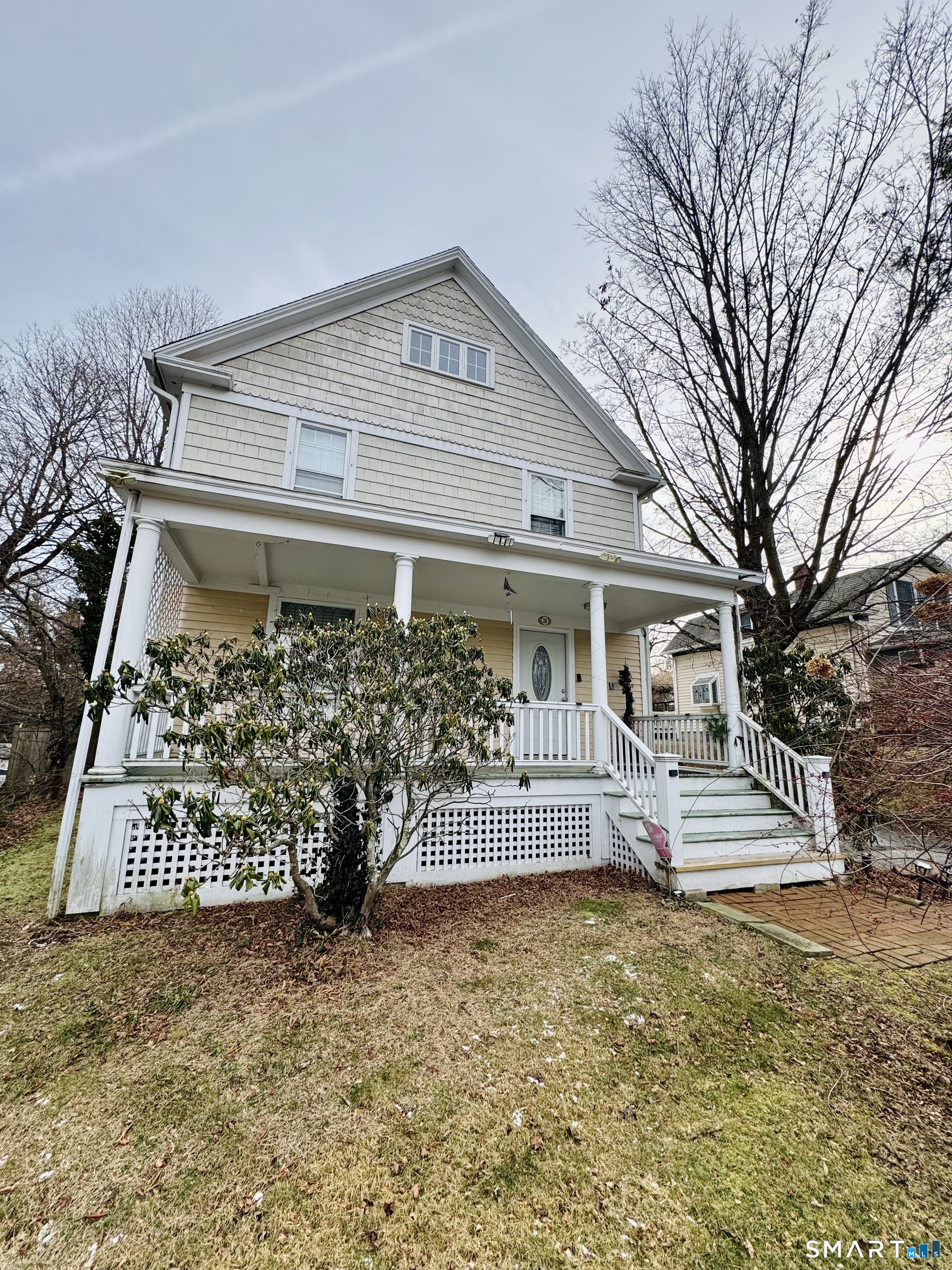38 Wooster Hts Road Danbury, CT 06810 - Photo 1 of 15 front view of a house with a yard