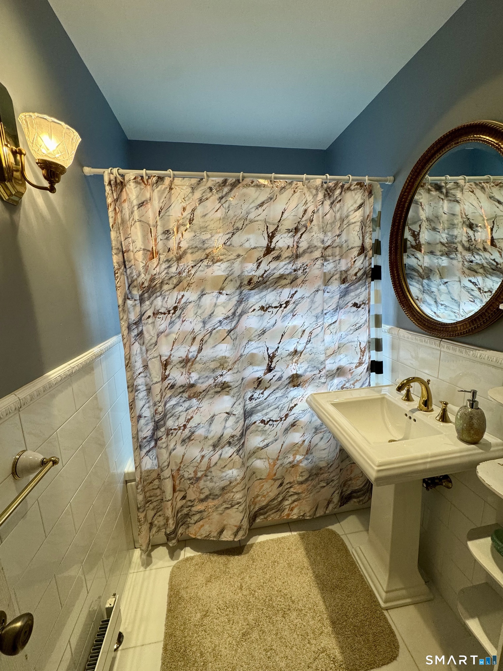 38 Wooster Hts Road Danbury, CT 06810 - Photo 11 of 15 a bathroom with a sink and a mirror