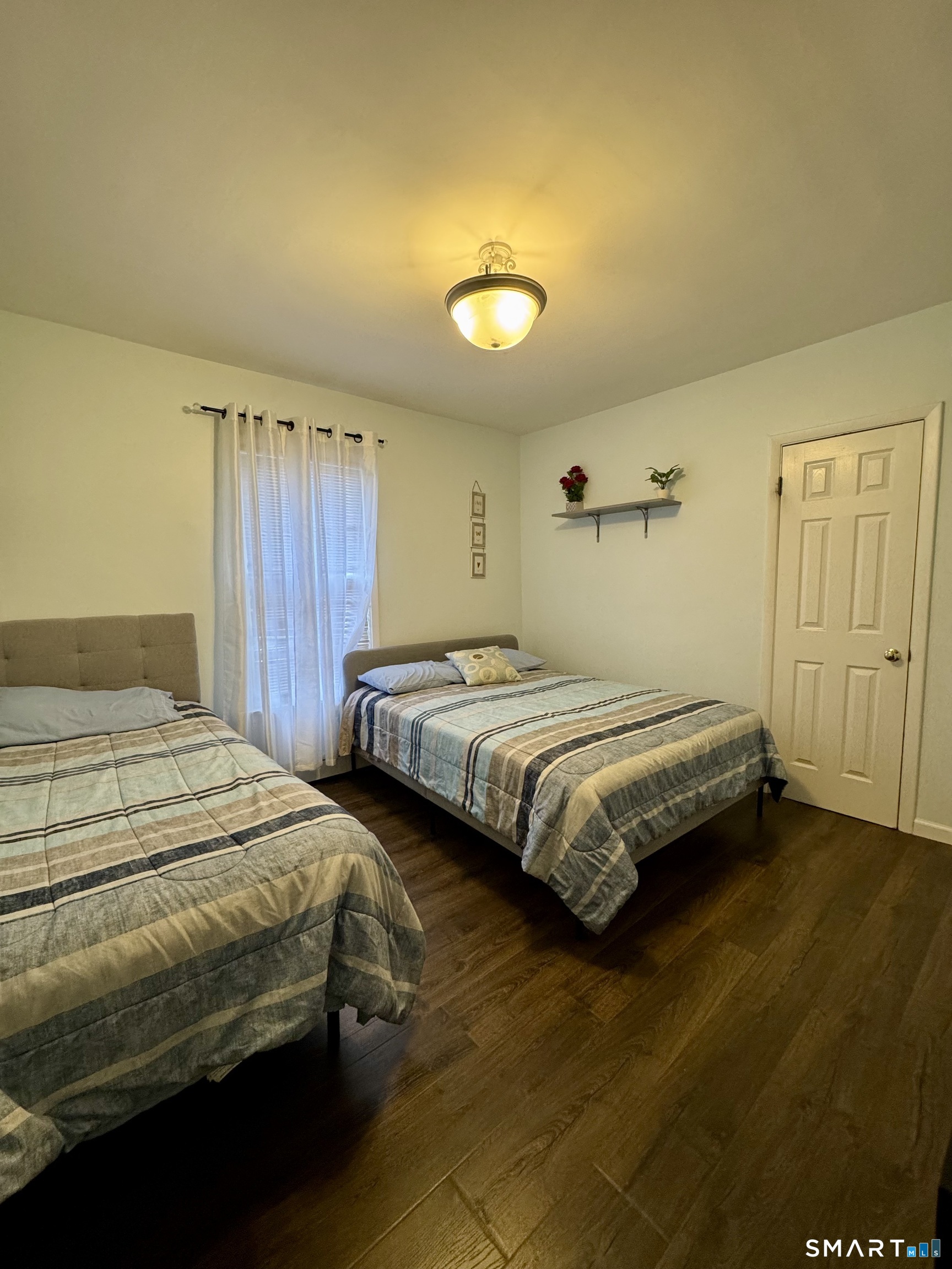 38 Wooster Hts Road Danbury, CT 06810 - Photo 9 of 15 a bedroom with bed and a window