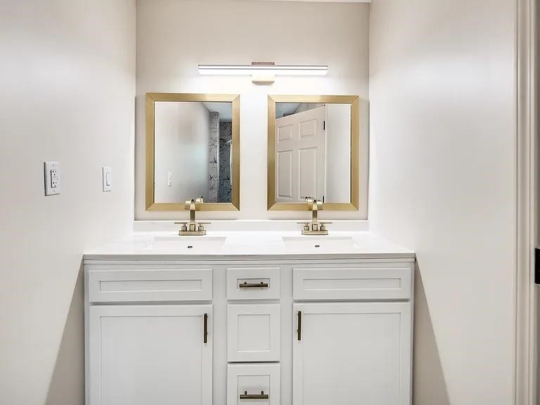 7441 Walsh Road Millington, TN 38053 - Photo 11 of 16 a bathroom with a sink vanity and a mirror